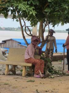 Pyjama-clad construction worker takes a break