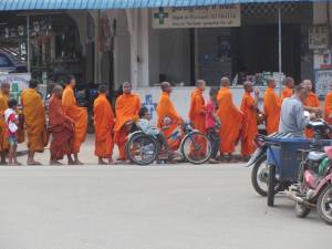 Monks collecting alms in Kampong Cham today