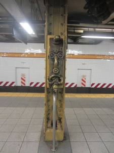Subway art galore. An ugly steel structural column transformed by Tom Otterness in "Life Underground" at West 14th St Station