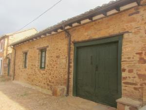 Spanish courtyard and house as seen from the street